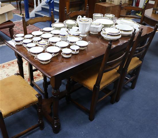 A refectory table and six chairs W.180cm